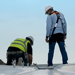 Commercial roof drainage and ice management on a Colorado building